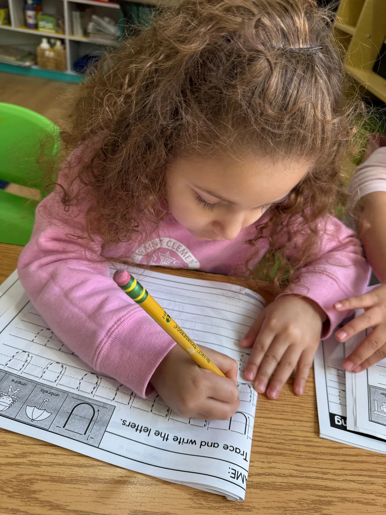 Child practicing coloring and fine-motor skills